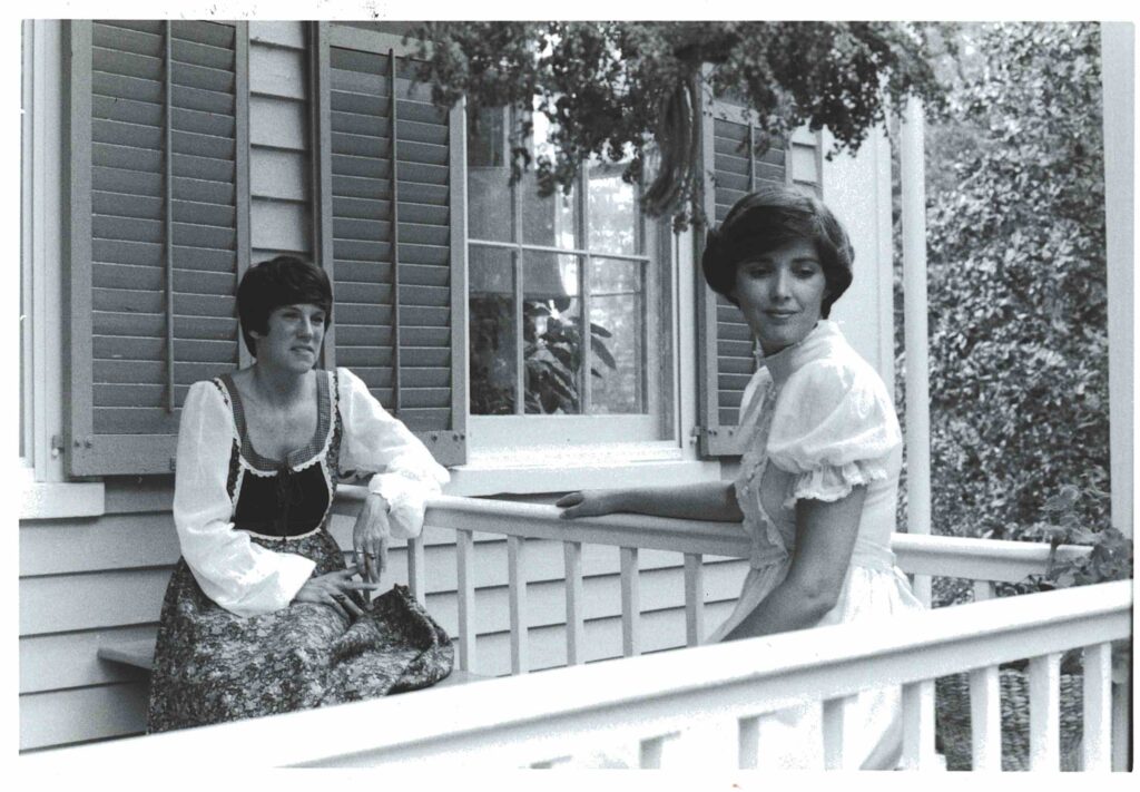 Two women on the front porch of the manor house in 1979